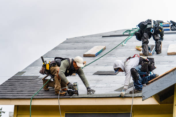 Professional Gutter Installation technician working in Pittsfield, NH
